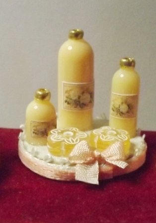 PEACH TOILETRIES ON SILK LINED TRAY